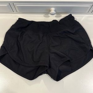 black shiny ivivva size 12 shorts